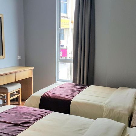 Residence 21 Boutique Inn Miri Quarto foto