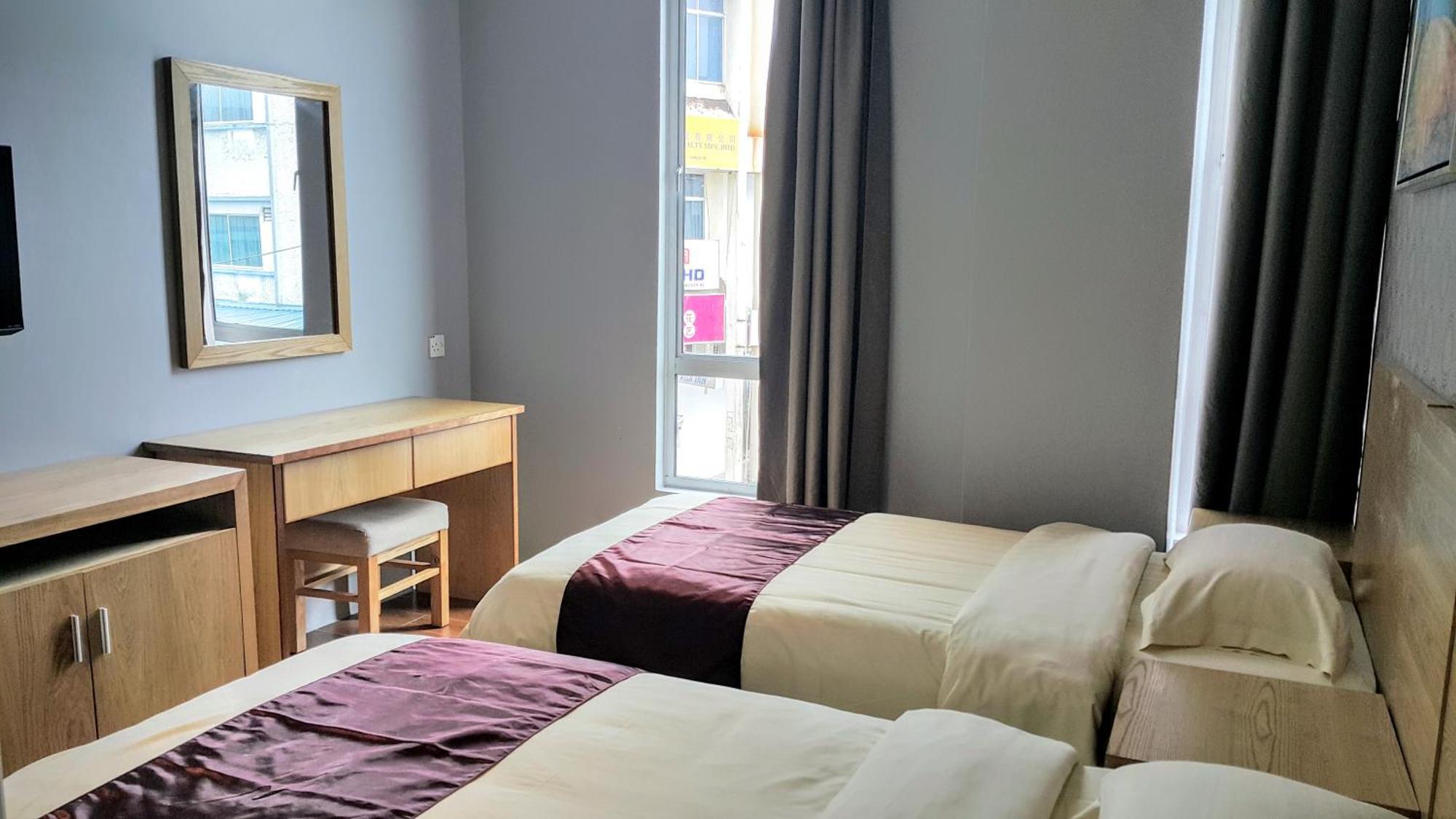 Residence 21 Boutique Inn Miri Quarto foto
